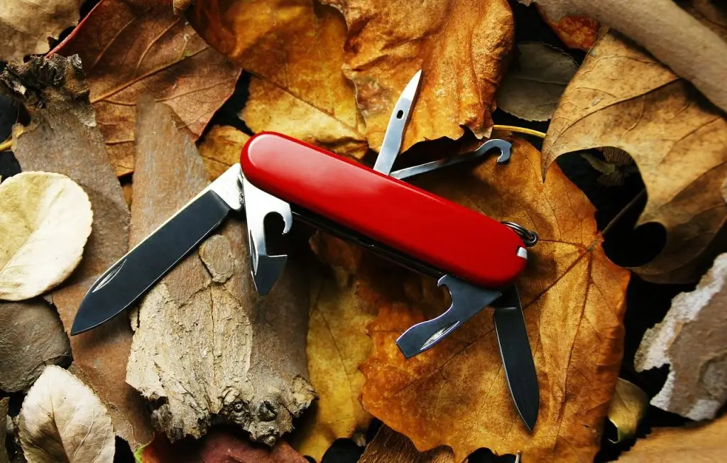saber, knife, swiss army knife, tools, beer bottle opener, screwdriver, saber, saber, saber, swiss army knife, swiss army knife, swiss army knife, swiss army knife, swiss army knife, tools, screwdriver